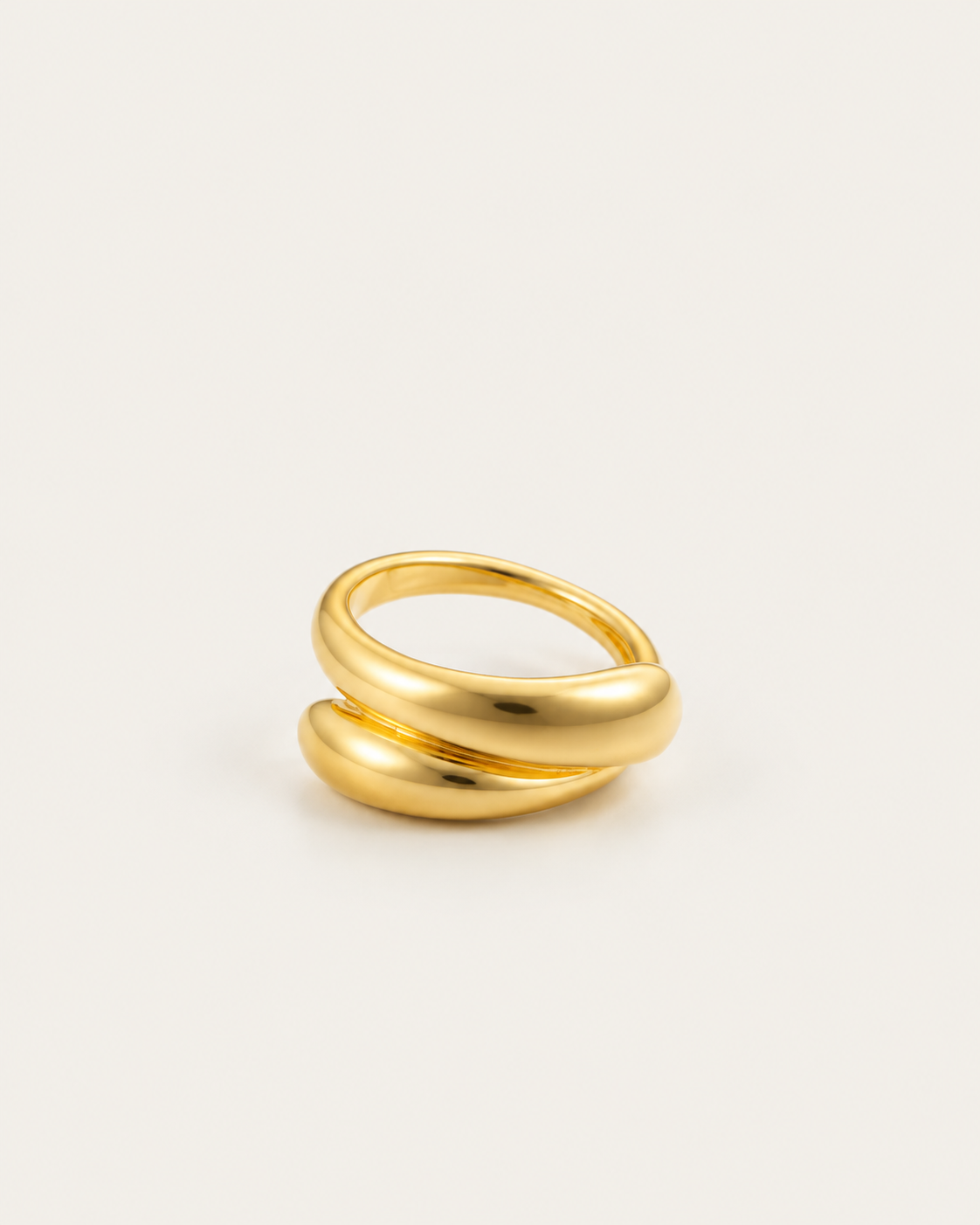 Gold-tone ring with two rounded contours, front view of the joined bands.