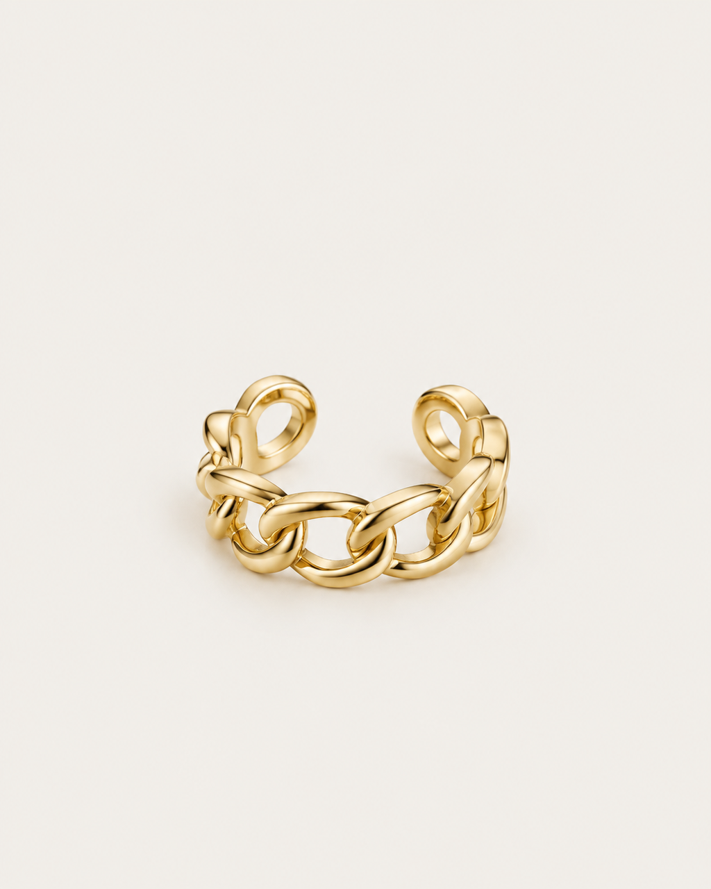 Gold-tone open ring with oval chain links, angled view showing the links and open back.