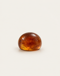 Brown marbled dome ring, front view of the rounded surface.