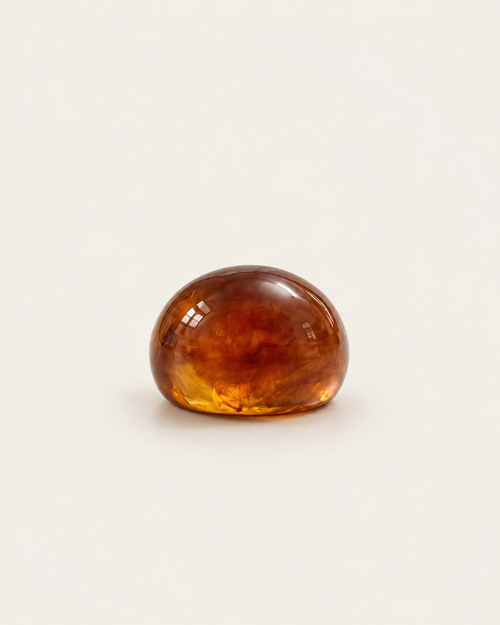 Brown marbled dome ring, front view of the rounded surface.