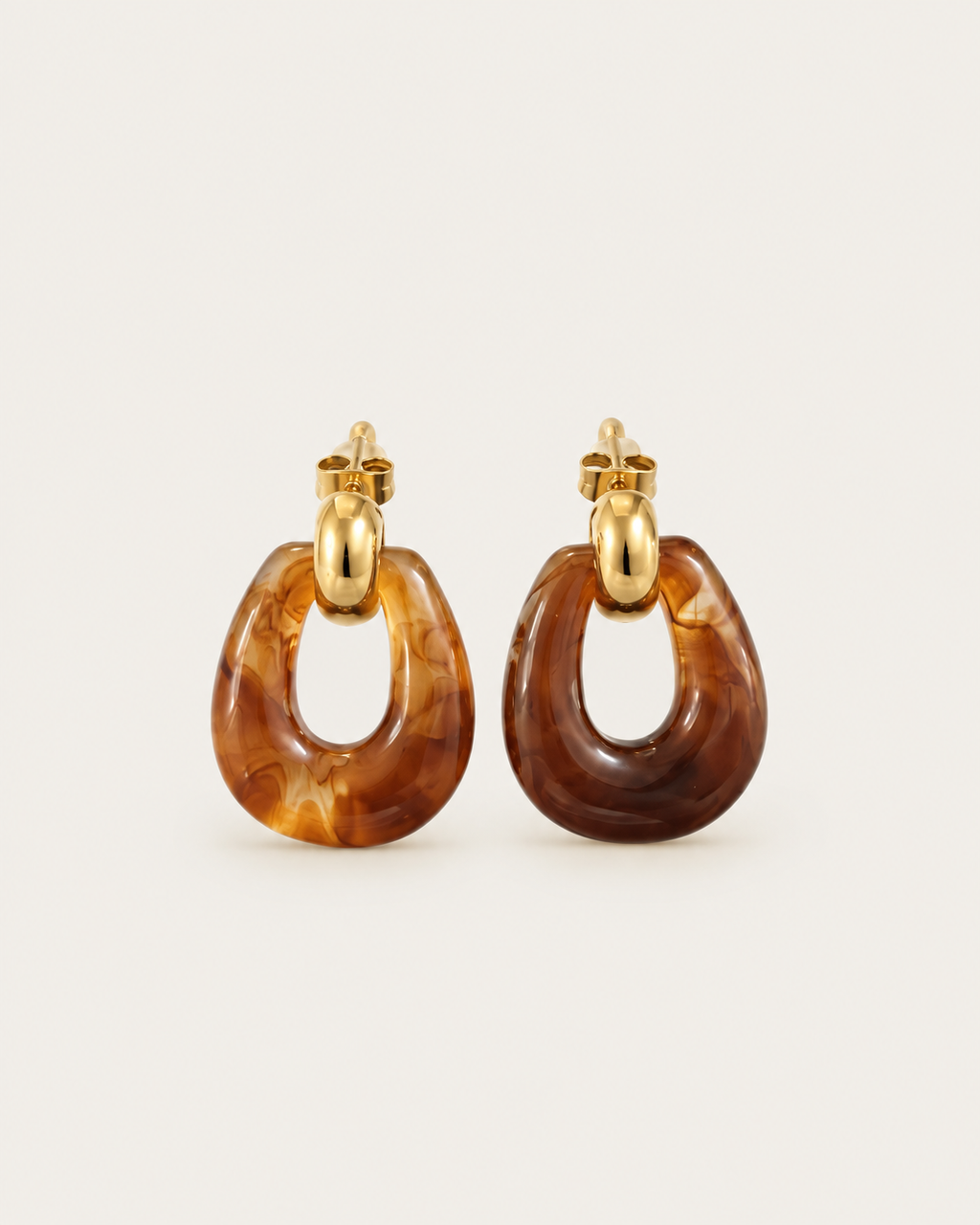Pair of brown marbled oval drop earrings with gold-tone upper links, shown together.