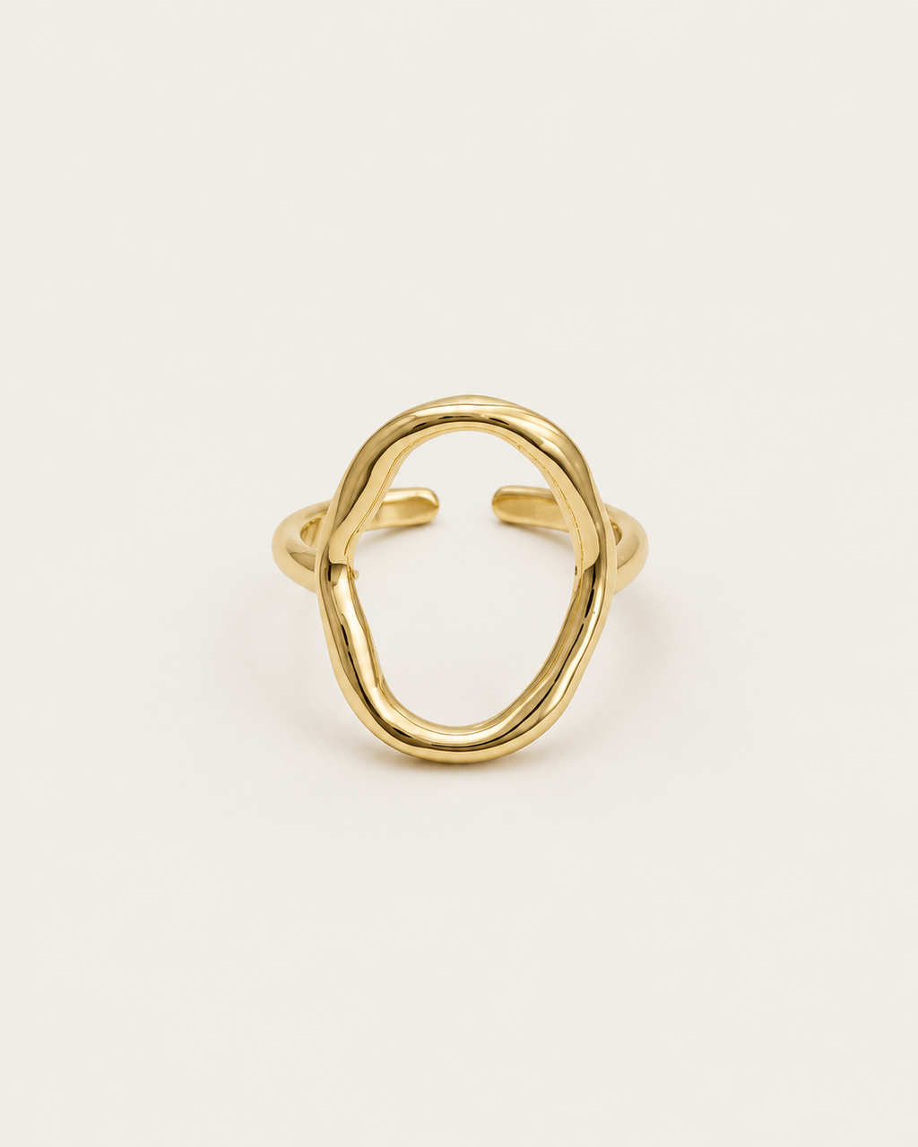 Gold-tone open ring with a tall hollow oval outline, front view.