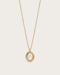 Gold-tone necklace with a white oval accent in a double-rimmed pendant, front view.