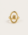 Gold-tone ring with a bee inside an open oval frame, front view.
