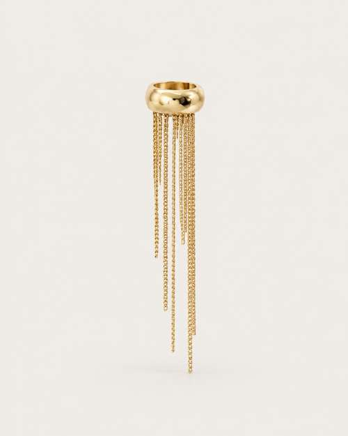 One gold-tone ear cuff with uneven chain fringes, shown on its own.