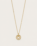 Gold-tone necklace with concentric circle pendants, front view.
