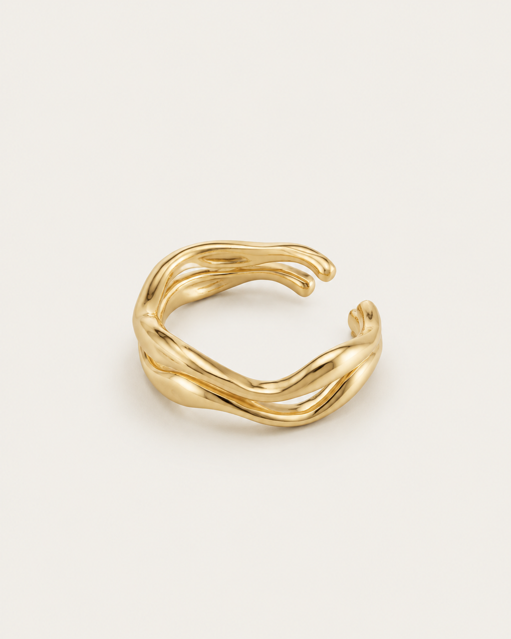 Set of two gold-tone wave stacking rings, shown stacked together.