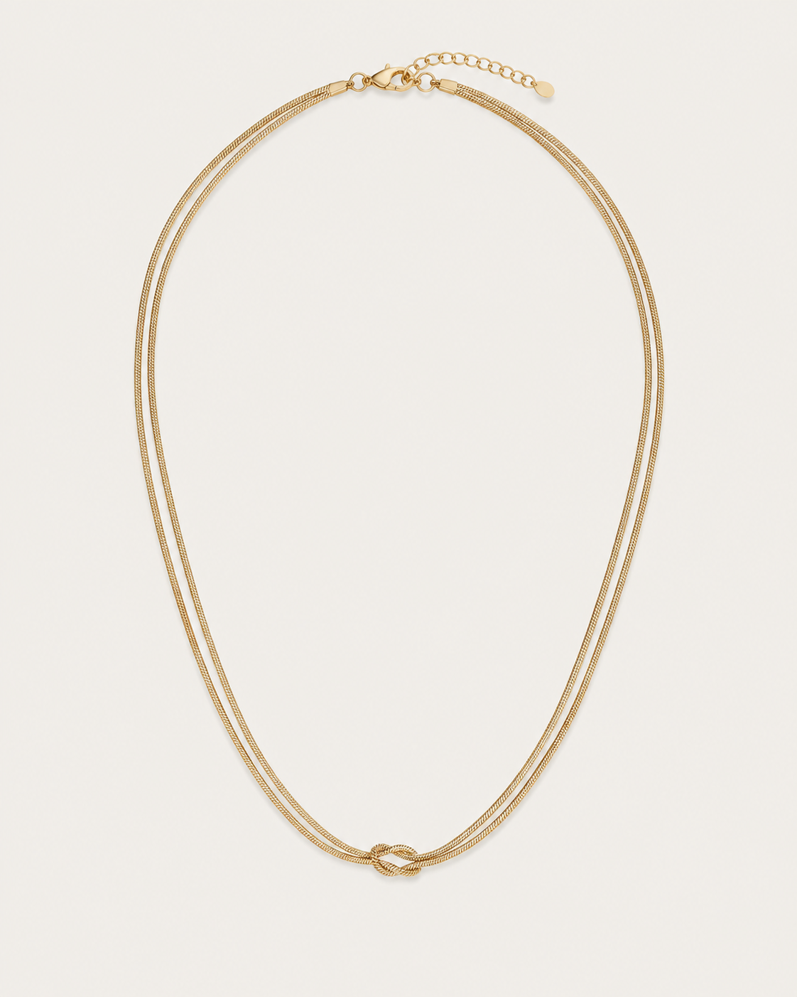 Gold-tone double-chain necklace with a central knot, front view.