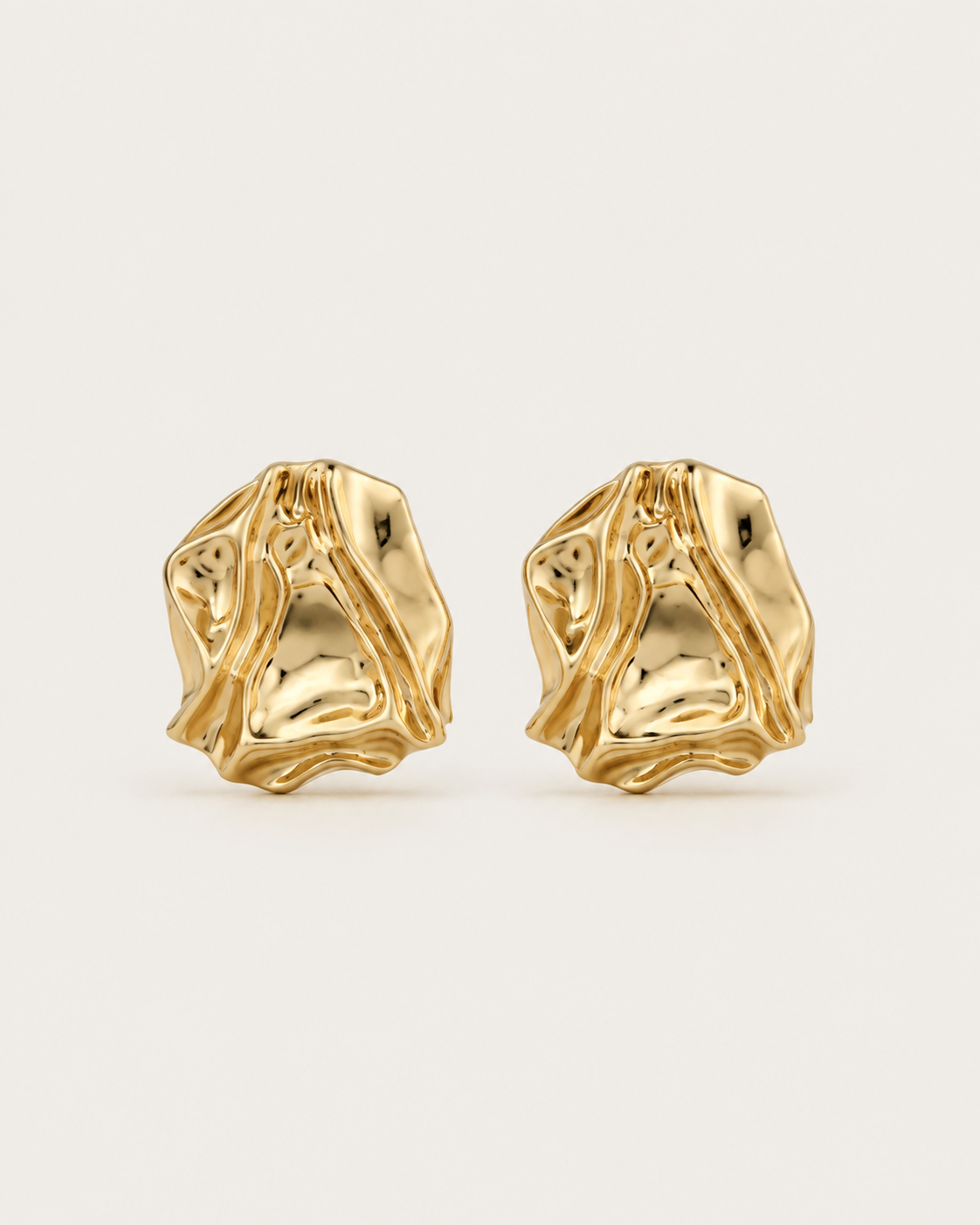 Pair of gold-tone crumpled stud earrings with irregular folds, shown together.