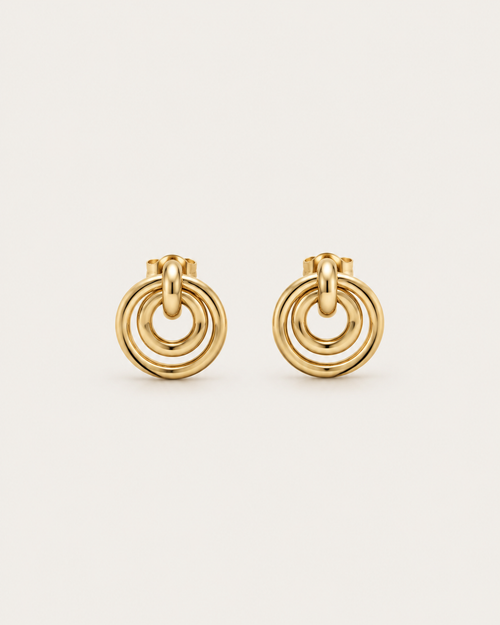 Pair of gold-tone concentric circle drop earrings, shown together.