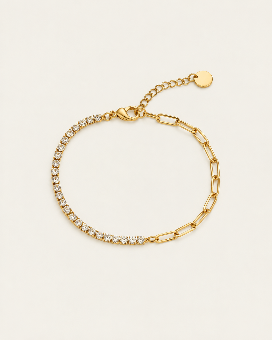 Gold-tone bracelet combining paperclip links and a row of clear stone accents, laid out with its extension chain.