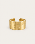 Wide gold-tone ring with a hammered surface, front view.